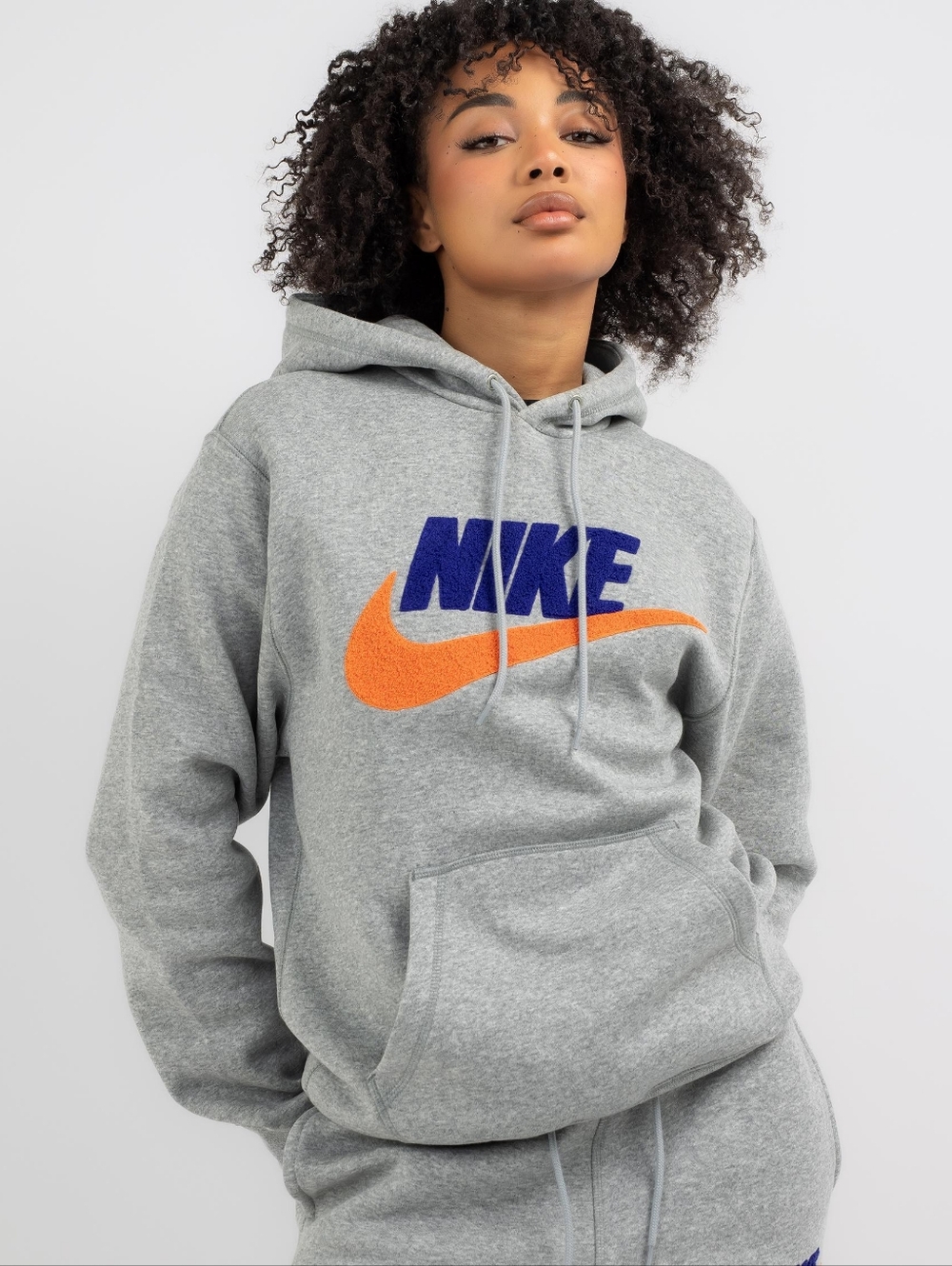 Nike Grey Crewneck Sweatshirt with Blue NIKE Logo and Orange Swoosh